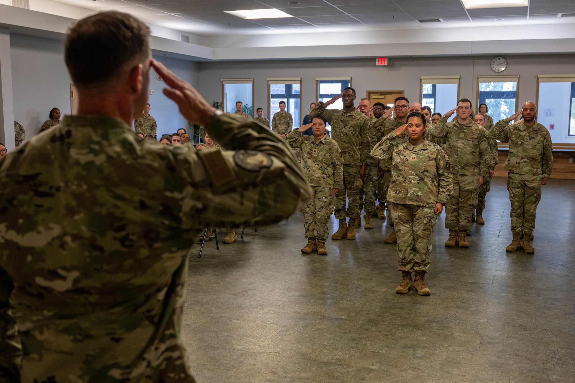 U.S. Air Force Lt. Col. Jonathan McQuaig, 354th Healthcare Operations Squadron commander, renders his first salute during the HCOS assumption of command ceremony at Eielson Air Force Base, Alaska, June 23, 2026.