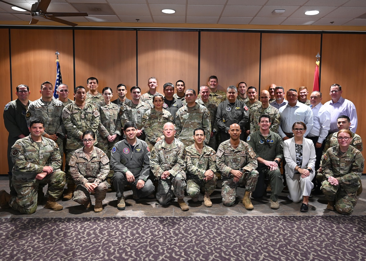 Twelfth Air Force, Air Forces Southern (AFSOUTH) and the Peruvian air force (FAP) leaders pose for a group photo during the United States and Peru Airman-to-Airman Staff Talks, at Davis-Monthan Air Force Base, Arizona, June 16. The talks provided a forum to exchange best practices in aircraft operations, maintenance, logistics, training, and resource planning, strengthening interoperability and future cooperation between the two air forces. (U.S. Air Force photo by Staff Sgt. Abbey Rieves)