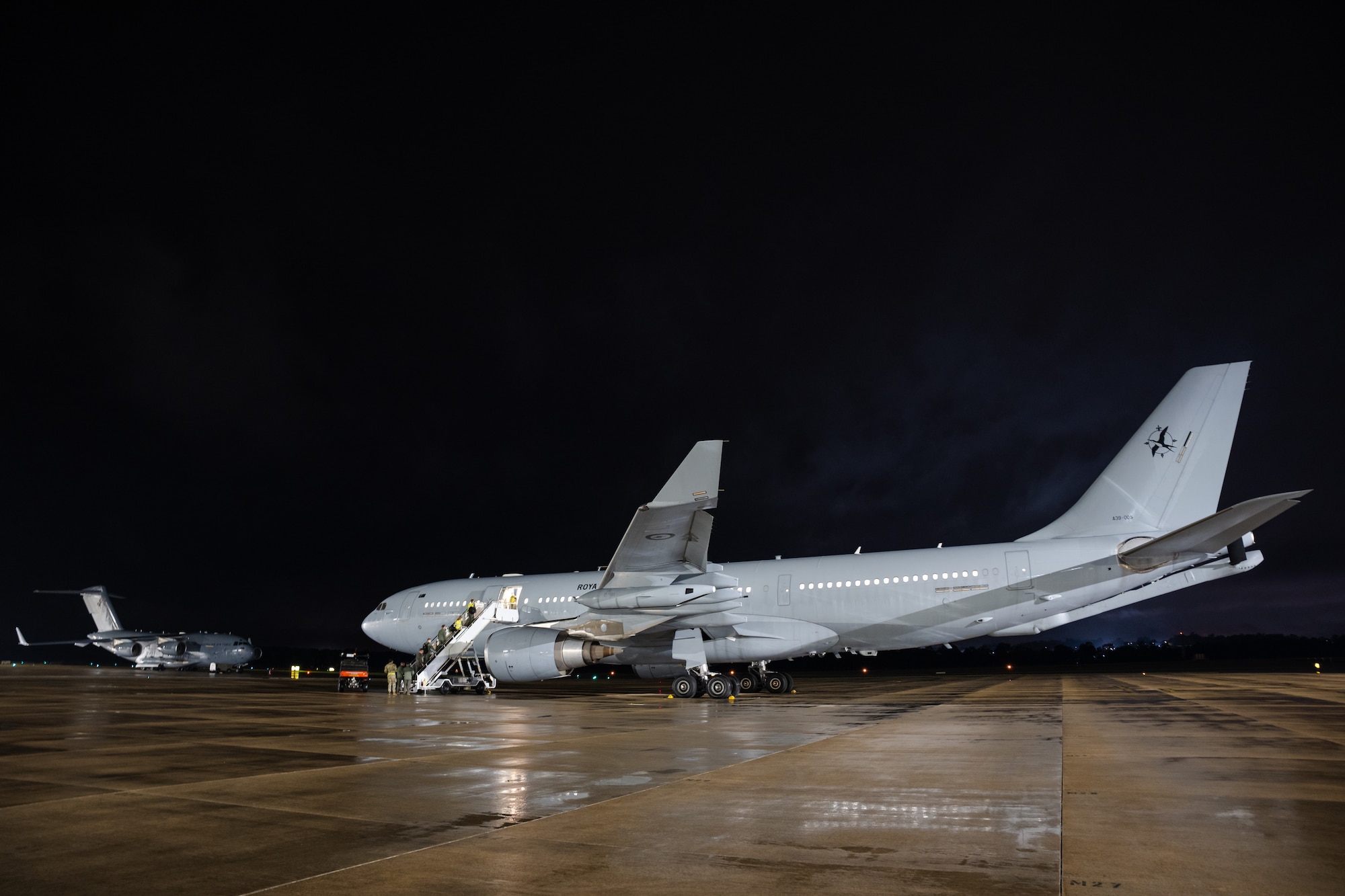 Aircrew board a Royal Australian Air Force KC-30A multi-role tanker transport aircraft at RAAF Base Amberley, Queensland, Australia, June 10, 2026.