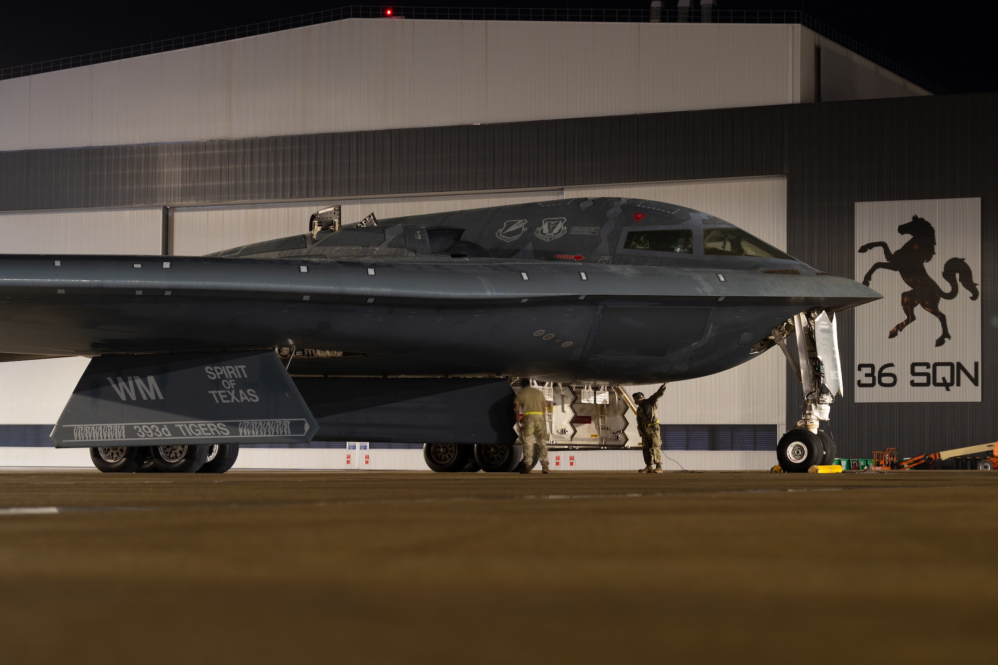U.S. Air Force crew chiefs assigned to the 393rd Expeditionary Bomb Squadron prepare a B-2 Spirit aircraft for departure at Royal Australian Air Force Base Amberley, Queensland, Australia, June 11, 2026.