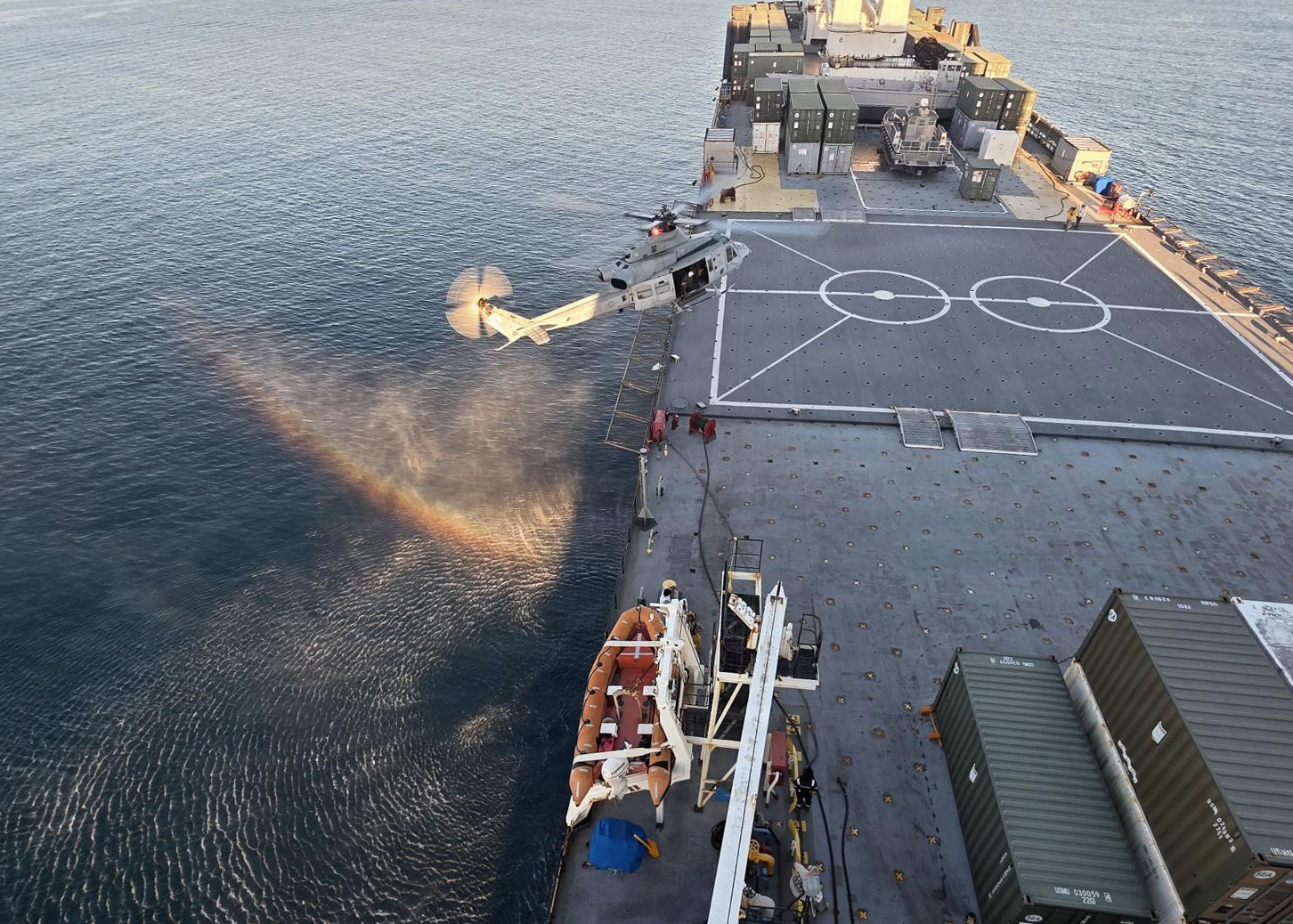 A U.S. Marine Corps UH-1Y Venom helicopters with Marine Light Attack Helicopter Squadron 367, Marine Aircraft Group 39, 3rd Marine Aircraft Wing, lands aboard Military Sealift Command’s prepositioning ship USNS Seay (T-AKR 302), during deck landing qualifications, at Kin Bay, Okinawa, Japan, June 22, 2026. (Courtesy photo)