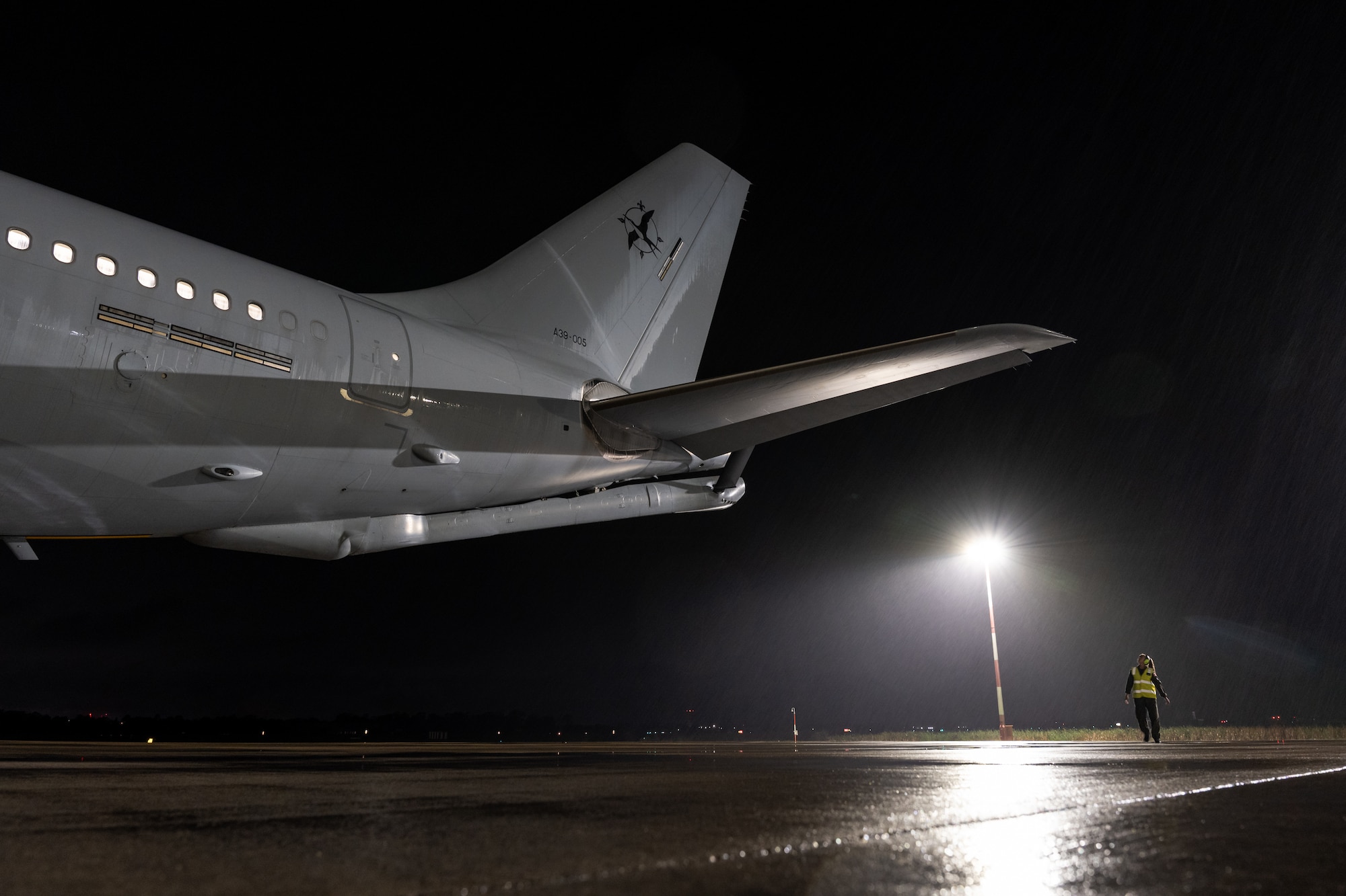 A Royal Australian Air Force pilot assigned to the No. 33 Squadron performs a preflight check on a KC-30A multi-role tanker transport aircraft at RAAF Base Amberley, Queensland, Australia, June 10, 2026.