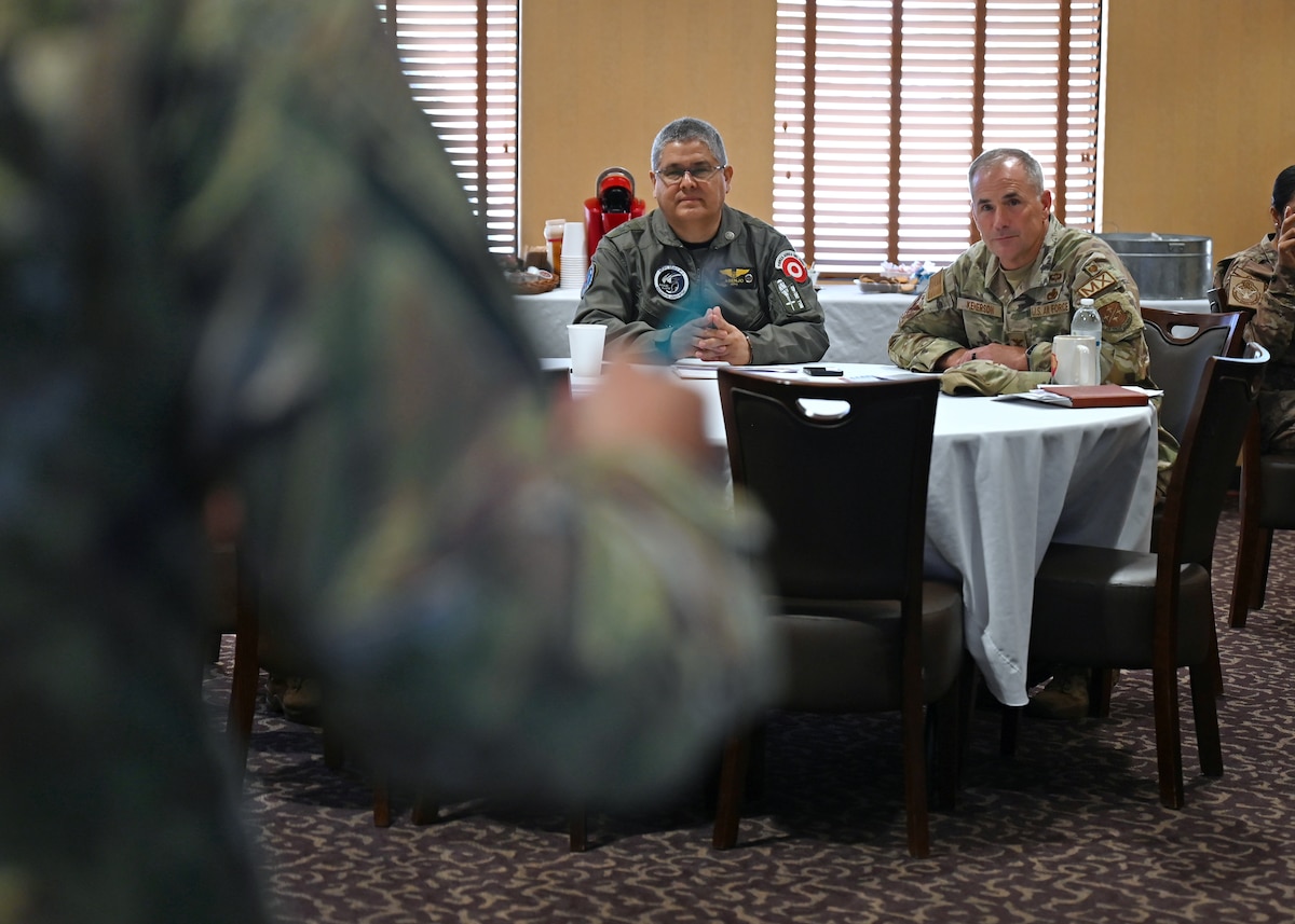 Peruvian air force (FAP) Maj. Gen. Martin Asenjo Gallo, FAP deputy chief of the general staff, receives a brief during the United States and Peru Airman-to-Airman Staff Talks, at Davis-Monthan Air Force Base, Arizona, June 16, 2026. Gallo and Peruvian air force members received information on how to support F-16 Fighting Falcon aircraft maintenance programs. (U.S. Air Force photo by Staff Sgt. Abbey Rieves)