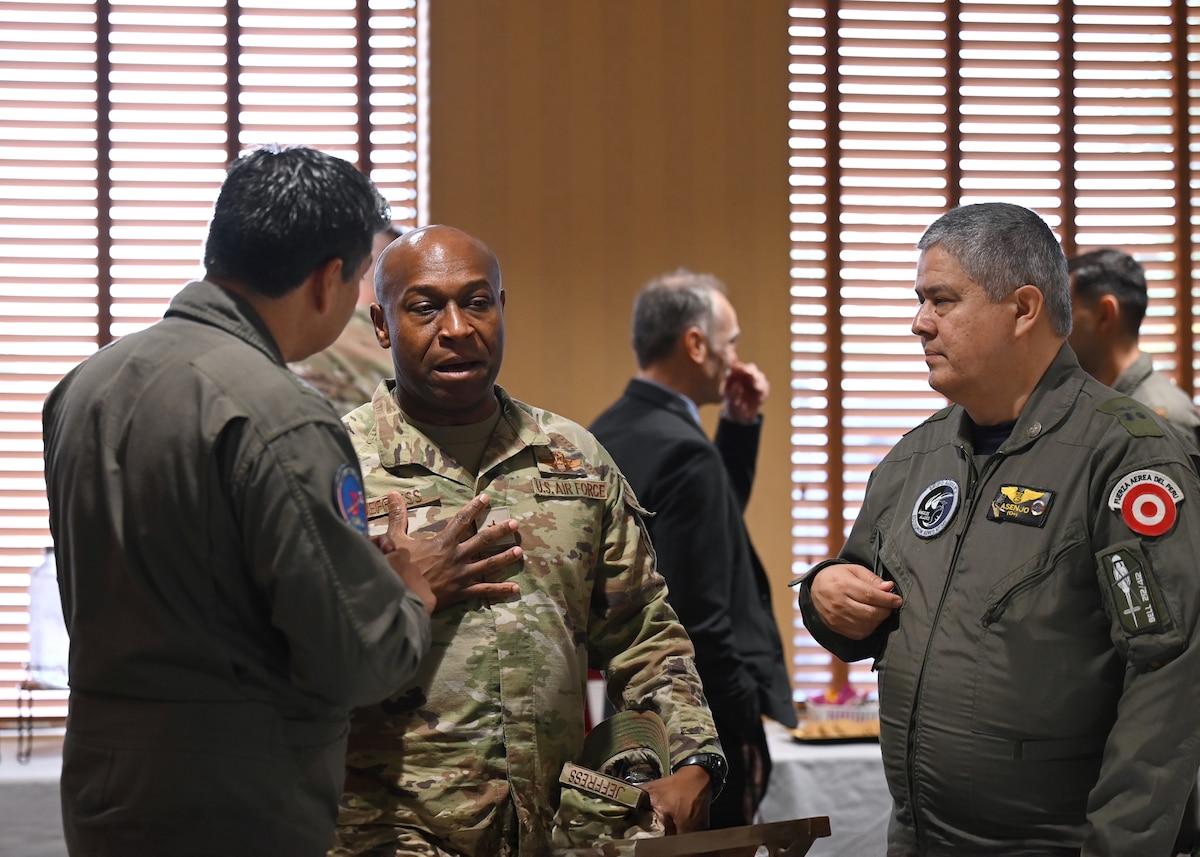 U.S. Air Force Brig. Gen. Henry Jeffress III, 12th Air Force, Air Forces Southern (AFSOUTH) deputy commander, center, speaks with Peruvian air force (FAP) leaders during the United States and Peru Airman-to-Airman Staff Talks, at Davis-Monthan Air Force Base, Arizona, June 15, 2026. The discussions reinforced military-to-military cooperation, enabling both air forces to synchronize efforts and strengthen readiness against shared regional threats. (U.S. Air Force photo by Staff Sgt. Abbey Rieves)
