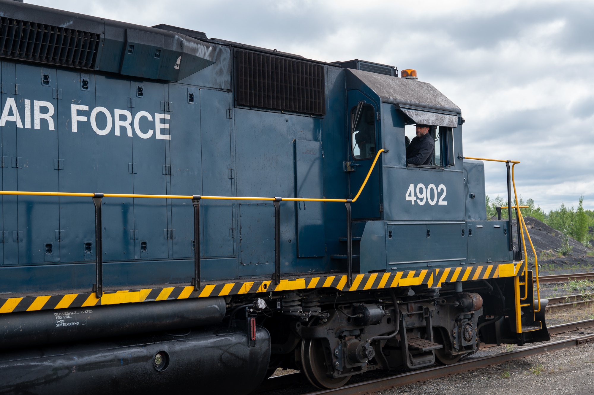Under Secretary of the Air Force Matt Lohmeier operates an Air Force locomotive during a visit to Eielson Air Force Base, Alaska, June 23, 2026.