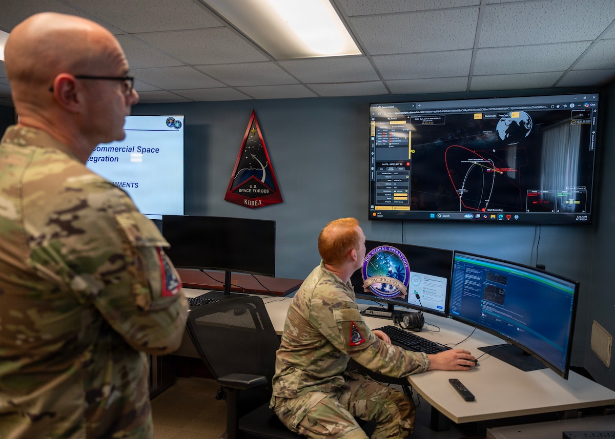 Chief Master Sgt. of the Space Force John Bentivegna receives a demonstration on the joint commercial operations at Osan Air Base, Republic of Korea, June 15, 2026. The demonstration highlighted the collaborative efforts of U.S. and ROK service members who leverage commercial space capabilities to enhance shared awareness. (U.S. Air Force photo by Staff Sgt. Sarah Williams)