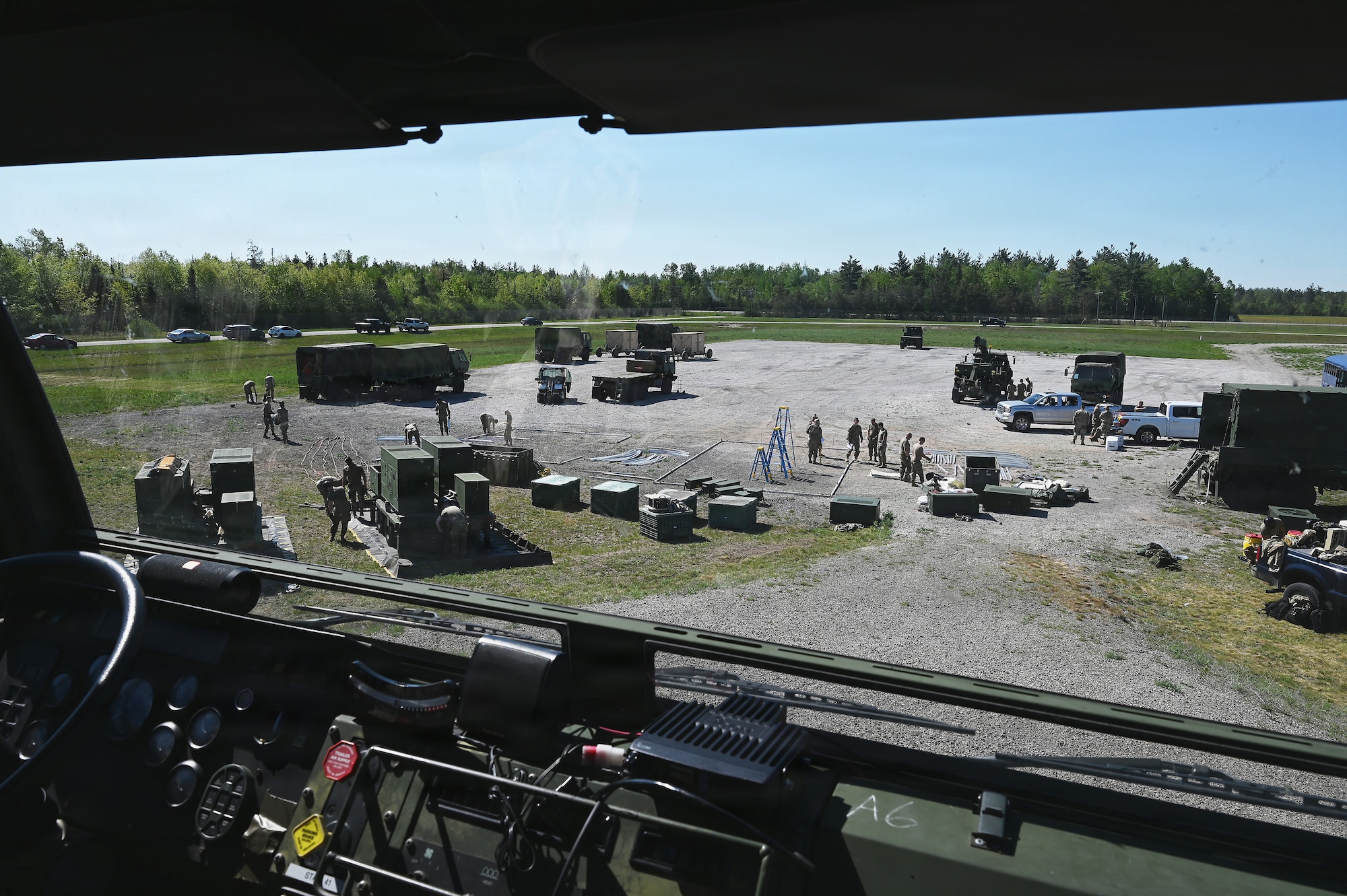 Airmen assigned to the 123rd Air Control Squadron set up camp June 1, 2026 for a field training exercise at the Alpena Combat Readiness Training Center in Michigan. The Air National Guard is developing and validating future tactics, techniques and procedures for distributed and austere operations during Large-Scale Combat Operations. (U.S. Air National Guard photo by Shane Hughes)