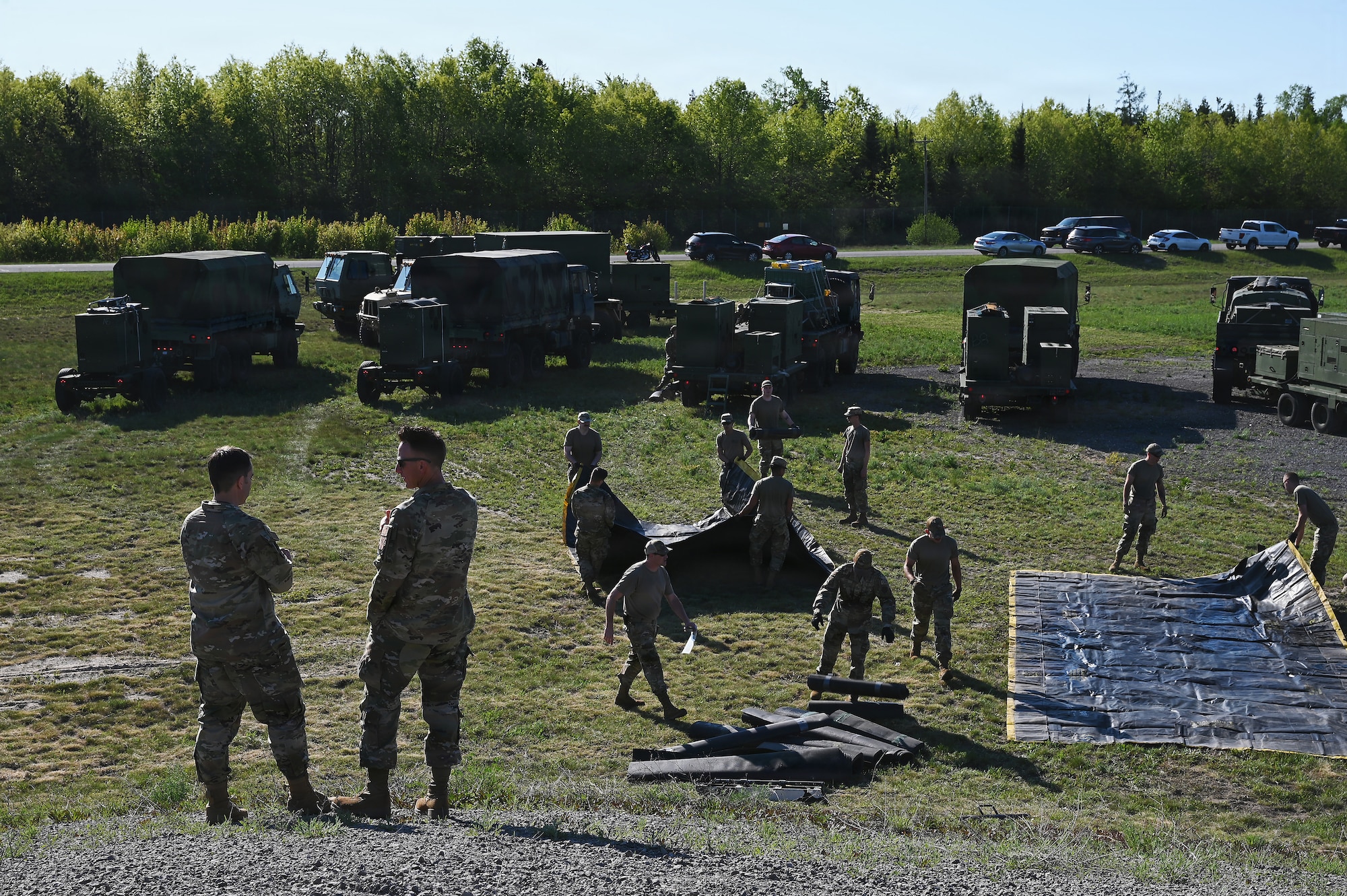 Airmen assigned to the 123rd Air Control Squadron set up generators June 1, 2026 for a field training exercise at the Alpena Combat Readiness Training Center in Michigan. Annual training allows airmen to focus on readiness and proficiency items, future fighting concepts, and maintain a war-ready posture for members of the Air National Guard. (U.S. Air National Guard photo by Shane Hughes)