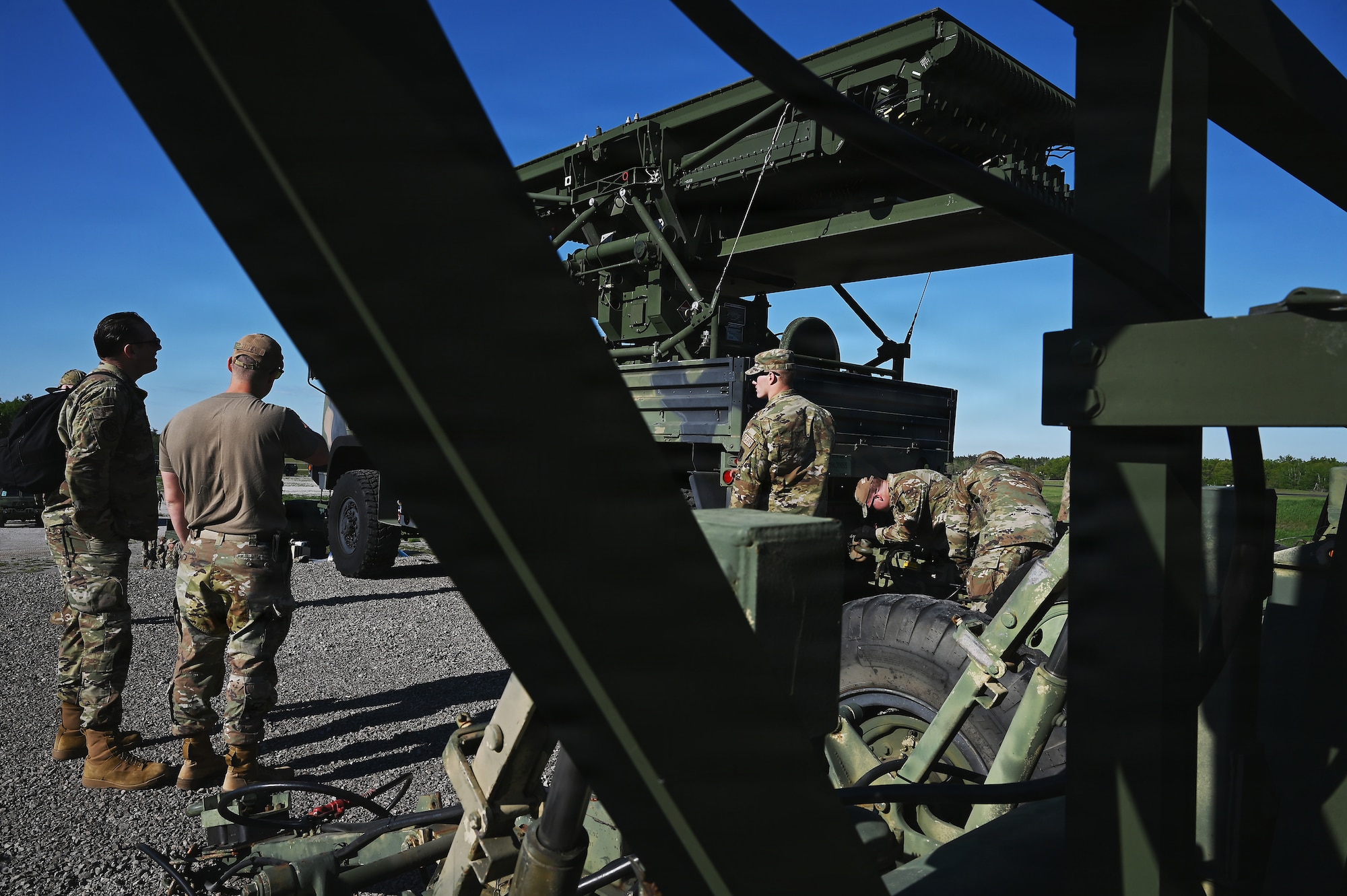 Airmen assigned to the 123rd Air Control Squadron prepare to deploy an AN/TPS field radar system June 1, 2026 for a field training exercise at the Alpena Combat Readiness Training Center in Michigan. Field training exercises provide realistic training opportunities, mimicking current and future combat environments as dictated by the National Defense Strategy. (U.S. Air National Guard photo by Shane Hughes)