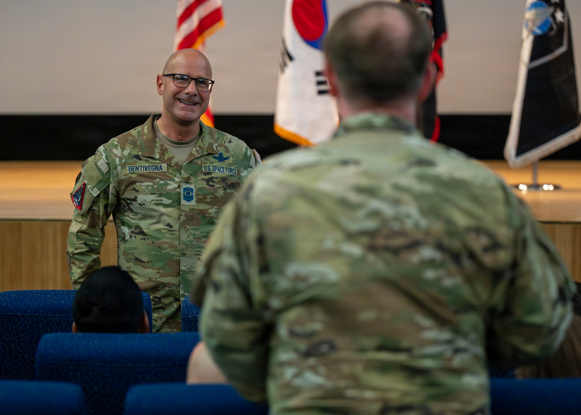 Chief Master Sgt. of the Space Force John Bentivegna answers a question during an all-call at Osan Air Base, Republic of Korea, June 16, 2026. Bentivegna answered questions from Guardians, sharing insights on leadership, mission readiness and the future of Space Force operations. (U.S. Air Force photo by Staff Sgt. Sarah Williams)