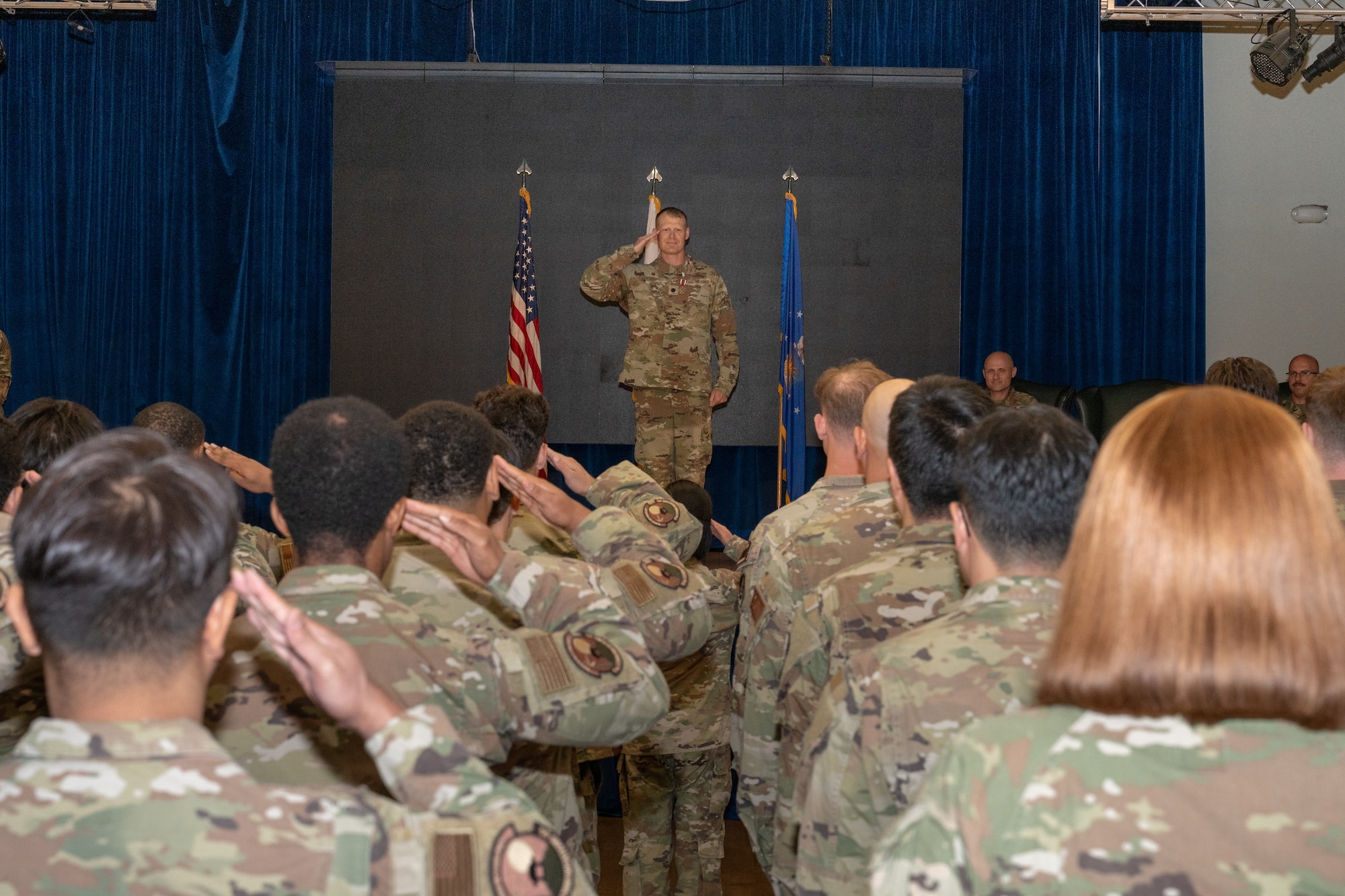 A commander gives his final salute to a squadron before relinquishing command.