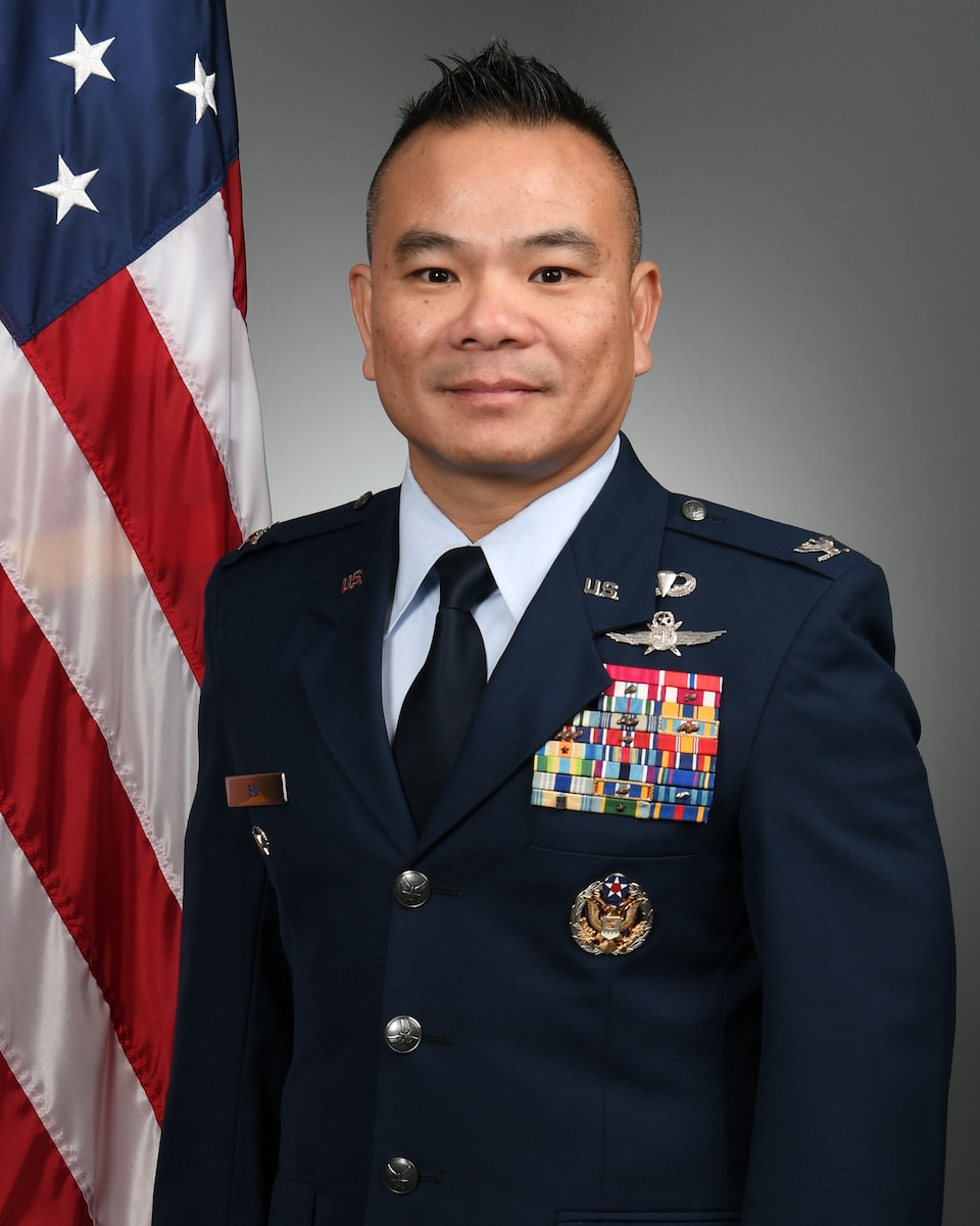 Service member poses for photo