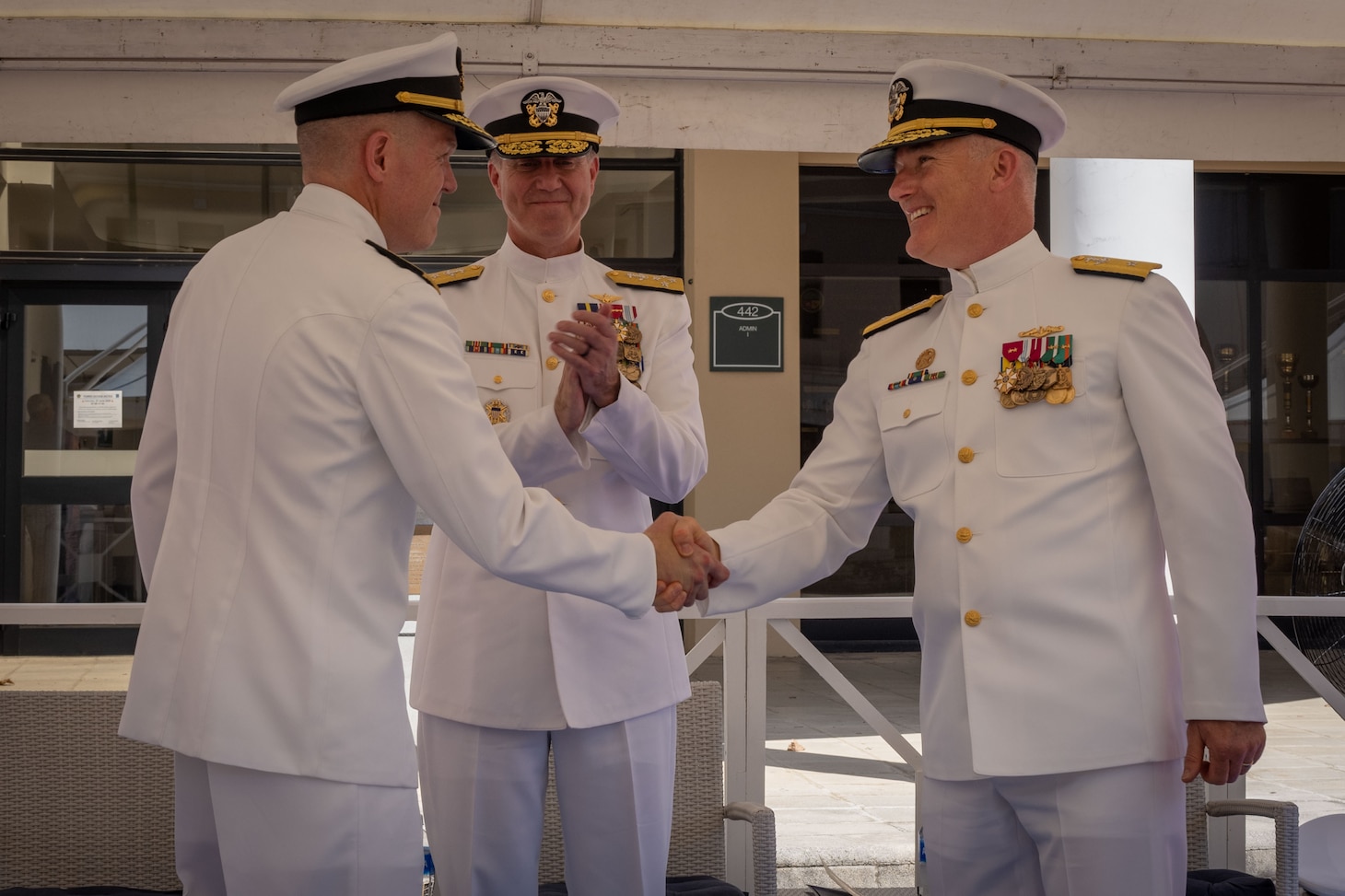 Rear Adm. Andrew Miller, director of Maritime Operations, U.S. Naval Forces Europe and Africa, commander, Submarine Group 8, salutes for arrival honors during his change of command ceremony at Naval Support Activity, Naples, Italy, June 26, 2026.