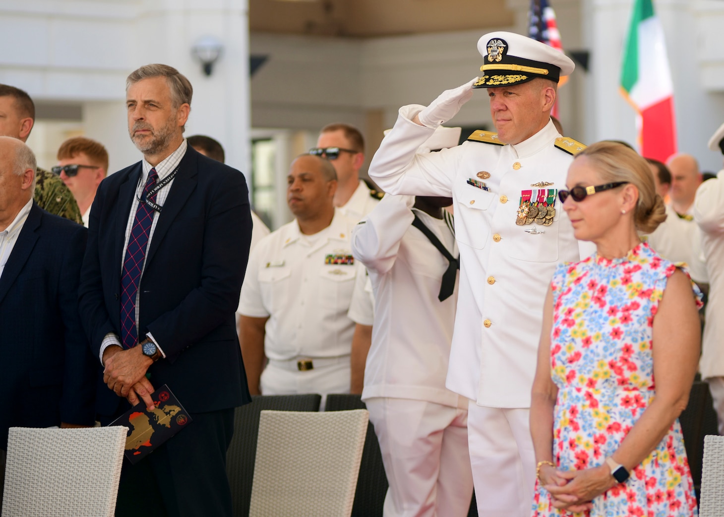Rear Adm. Andrew Miller, director of Maritime Operations, U.S. Naval Forces Europe and Africa, commander, Submarine Group 8, salutes for arrival honors during his change of command ceremony at Naval Support Activity, Naples, Italy, June 26, 2026.
