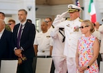 Rear Adm. Andrew Miller, director of Maritime Operations, U.S. Naval Forces Europe and Africa, commander, Submarine Group 8, salutes for arrival honors during his change of command ceremony at Naval Support Activity, Naples, Italy, June 26, 2026.