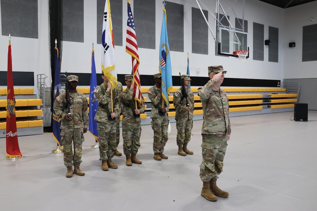 New unit commander renders a salute.