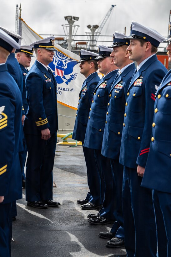 Coast Guard Lt. Cmdr. Michael Adam Young, commanding officer of Coast Guard Cutter John Witherspoon (WPC 1158), inspects the crew as part of the cutter’s change of command ceremony at Paradigm Pier in Kodiak, Alaska, June 16, 2026. Change of command ceremonies are a time-honored tradition that represent the passing of authority from one commanding officer to the next.

(U.S. Coast Guard photo by Petty Officer 3rd Class Nathan Bishop)