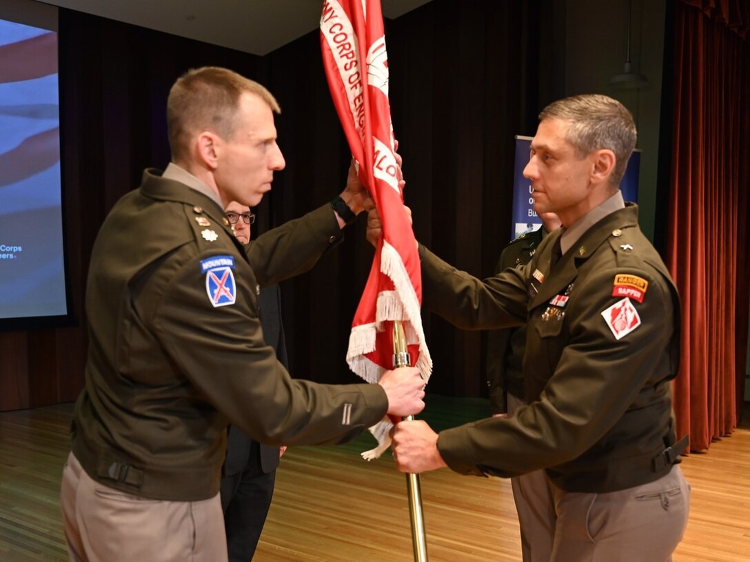 U.S. Army Lt. Col. Aaron Anderson receives the U.S. Army Corps of Engineers Buffalo District colors from USACE Great Lakes and Ohio Division Commander U.S. Army Brig. Gen. Daniel Herlihy during the district change of command ceremony in Buffalo, New York, June 26, 2026.