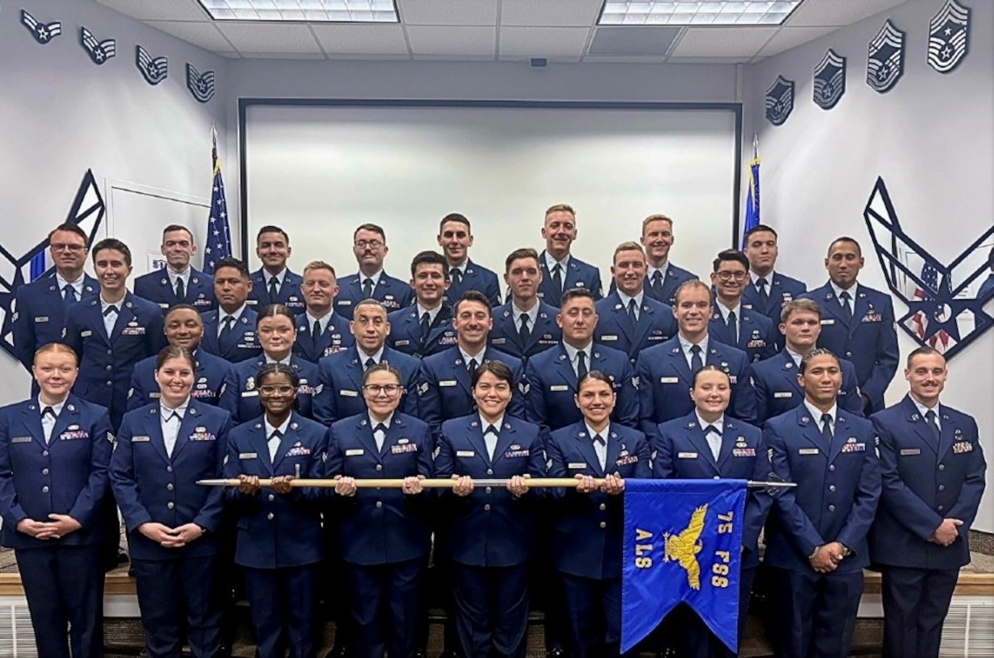 Airmen enrolled in Airman Leadership School Class 26-Echo were honored during a graduation ceremony June 26 at The Landing.