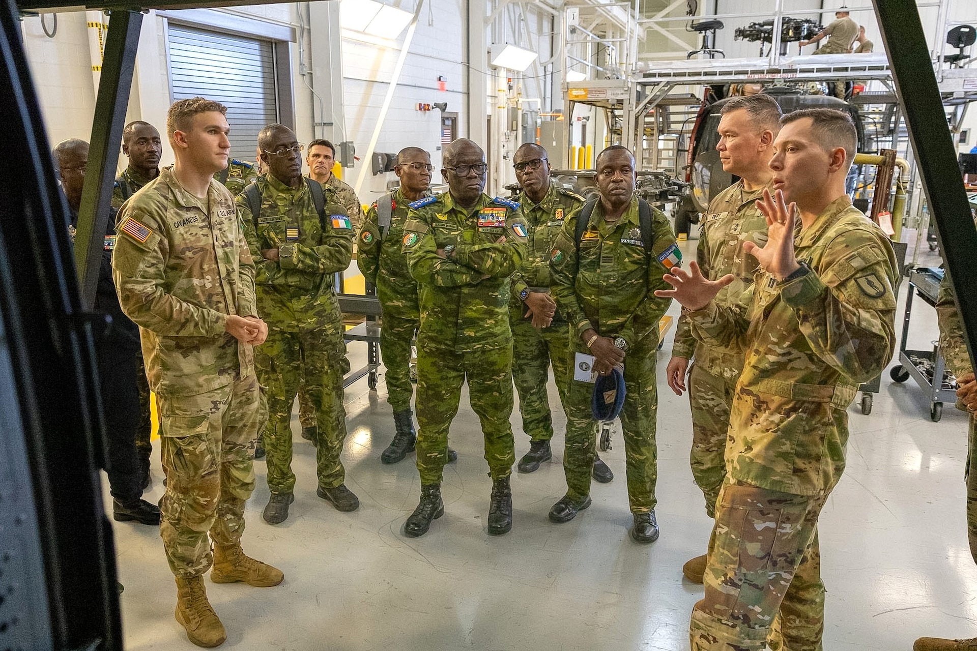 Senior leaders from the Côte d'Ivoire Armed Forces, accompanied by Pennsylvania National Guard leadership, receive a demonstration of capabilities during a tour of multiple facilities at Fort Indiantown Gap, Pennsylvania, June 26, 2026.