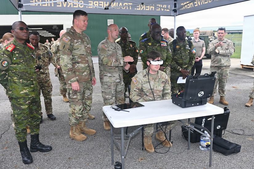 Senior leaders from the Côte d'Ivoire Armed Forces, accompanied by Pennsylvania National Guard leadership, receive a demonstration of capabilities during a tour of multiple facilities at Fort Indiantown Gap, Pennsylvania, June 26, 2026.