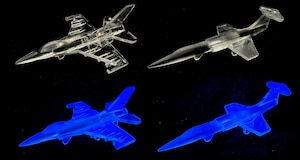 High-resolution 3D-printed planes, made of a scintillating plastic material, emit light in response to radiation (U.S. Air Force image).