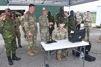Senior leaders from the Côte d'Ivoire Armed Forces, accompanied by Pennsylvania National Guard leadership, receive a demonstration of capabilities during a tour of multiple facilities at Fort Indiantown Gap, Pennsylvania, June 26, 2026.