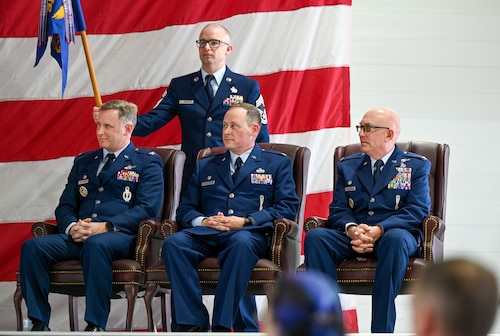 U.S. Air Force Col. Jimmy Schlabach, 91st Missile Wing commander (left), U.S. Air Force Col. Adam T. Rector, incoming 91st Maintenance Group (MXG) commander (center), and U.S. Air Force Col. Joseph Edington and 91st Maintenance Group (MXG) commander (right), engage during the 91st MXG change of command ceremony at Minot Air Force Base, North Dakota, June 5, 2026. The 91st MXG oversees maintenance, supply, transportation and munitions operations that support the wing’s global strike mission and long-term mission readiness.