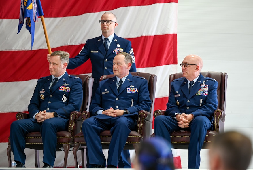 U.S. Air Force Col. Jimmy Schlabach, 91st Missile Wing commander (left), U.S. Air Force Col. Adam T. Rector, incoming 91st Maintenance Group (MXG) commander (center), and U.S. Air Force Col. Joseph Edington and 91st Maintenance Group (MXG) commander (right), engage during the 91st MXG change of command ceremony at Minot Air Force Base, North Dakota, June 5, 2026. The 91st MXG oversees maintenance, supply, transportation and munitions operations that support the wing’s global strike mission and long-term mission readiness.