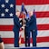 U.S. Air Force Col. Joseph Edington 91st Maintenance Group (MXG) commander, (right) hands over the guidon to Col. Jimmy Schlabach, 91st Missile Wing commander (left), during the 91st MXG change of command ceremony at Minot Air Force Base, North Dakota, June 5, 2026. Edington passed the guidon to Schlabach, who then presented it to the incoming commander, signifying the transfer of authority and responsibility within the 91st MXG.