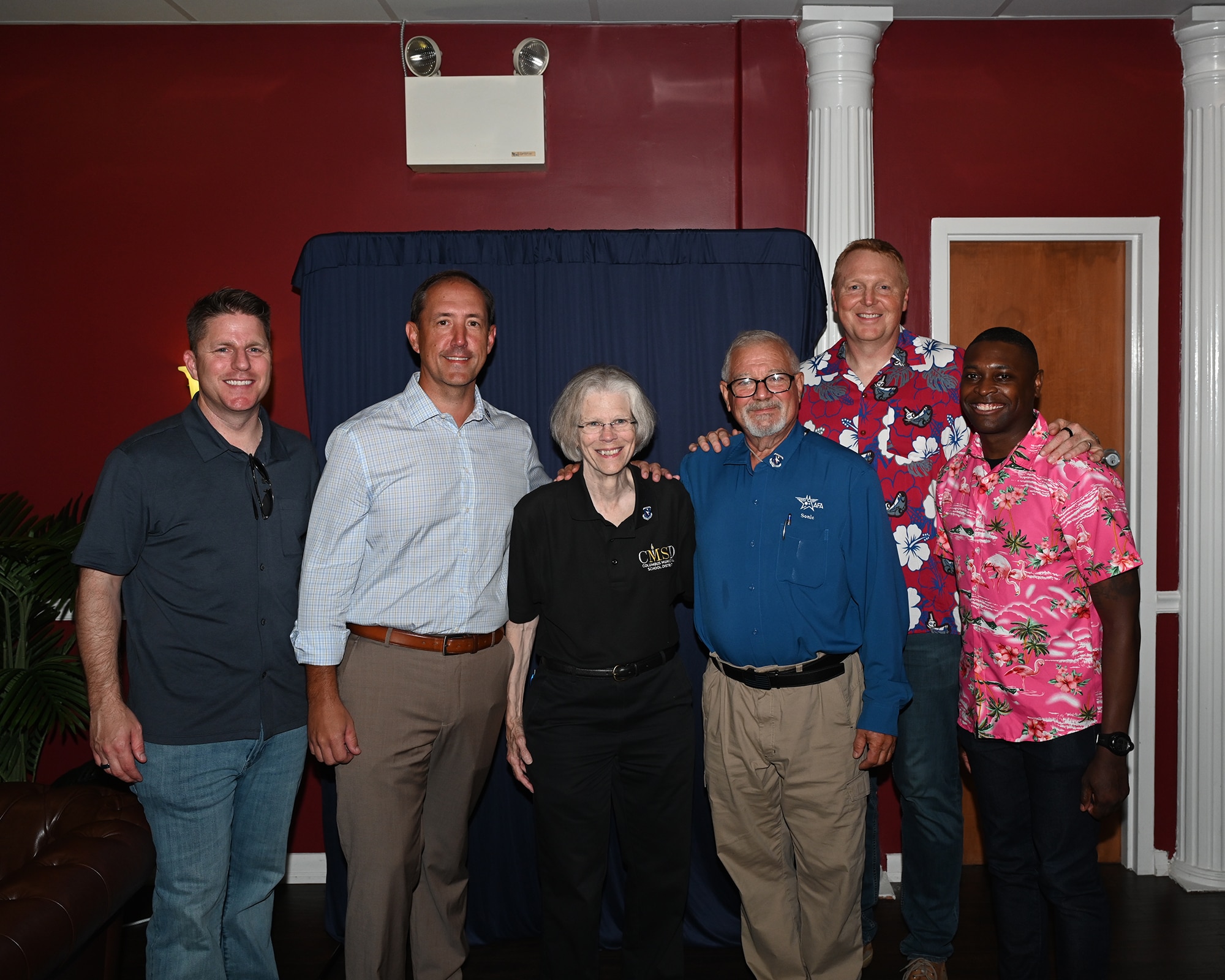Col. James Blech, 14th Flying Training Wing commander (outer left) and Chief Master Sergeant Lebaron King, 14th Flying Training Wing command chief (outer right) pose for a group photo with newly inducted Wingmen, Kevin Stafford, Dr. Jo Shumake, and Sonic Johnson.
