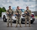 From left: U.S. Air Force Staff Sgt. Joe Jimenez, 2nd Security Forces Squadron certified law enforcement officer, Staff Sgt. Danny Gonzalez, 2nd SFS response force lead, and Staff Sgt. Martin Schortye, 2nd SFS base defense operation center controller, pose for a photo at Barksdale Air Force Base, Louisiana, June 5, 2026. The three defenders received the American Red Cross Lifesaving Award and an Air and Space Achievement Medal for their lifesaving actions following a motorcycle accident. (U.S. Air Force photo by Senior Airman Laiken King) (Portions of this image have been blurred for operational security.)