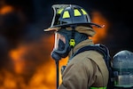 Photo of fire fighters from the Vermont National Guard's 158th Fighter Wing engaging in an aircraft fire during an exercise in New London, North Carolina.