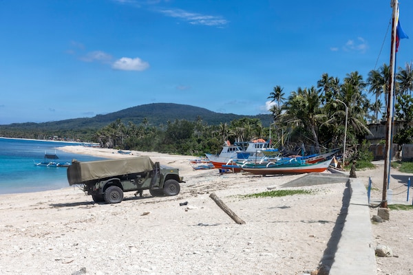 A Navy-Marine Expeditionary Ship Interdiction System assigned to 3rd Littoral Combat Team, 3rd Marine Littoral Regiment, 3rd Marine Division, is driven off a Philippine surface connector in support of maritime key terrain security operations during KAMANDAG 10 at Port Calayan, Philippines, June 22, 2026.