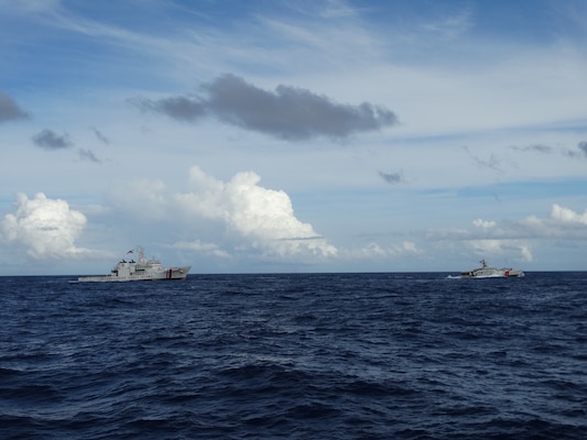Philippine Coast Guard Teresa Magbanua-class multi-role response vessel BRP Melchora Aquino (MMRV 9702) and U.S. Coast Guard Sentinel-class fast response cutter USCGC Charles Moulthrope (WPC 1141) sail in formation during part of the Maritime Cooperative Activity (MCA) in the Philippines’ Exclusive Economic Zone, June 27, 2026.