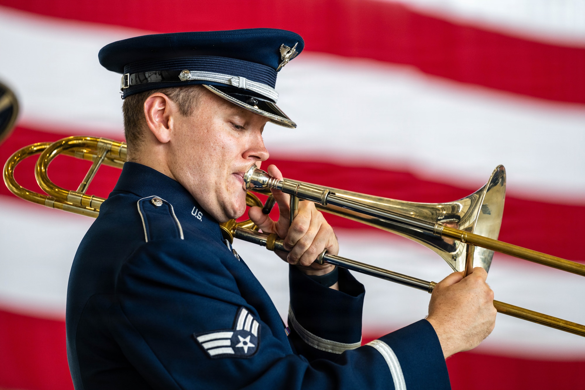 521 AMOW Airman plays the trombone.