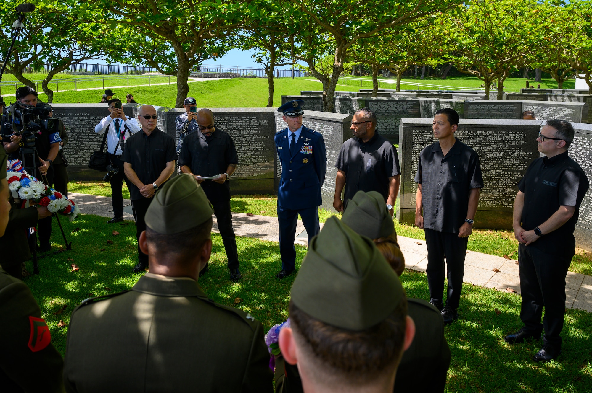 From left, Hawari Habrawi, American Chamber of Commerce in Okinawa vice president; Henry Hughes, USO Okinawa area director; U.S. Air Force Brig. Gen. John Gallemore, 18th Wing commander; Aaron Snipe, U.S. Embassy in Japan deputy chief of mission, and Andrew Ou, U.S. consul general in Okinawa, stand during the Okinawa Memorial Day ceremony at “The Cornerstone of Peace” in Peace Memorial Park, Okinawa, Japan, June 23, 2026. The annual ceremony commemorates the end of the Battle of Okinawa and honors the lives lost during one of the pacific theater’s bloodiest battles. (U.S. Air Force photo by Airman 1st Class Francisco Huerta)