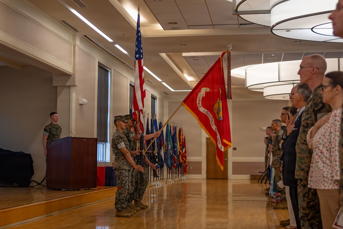 U.S. Marines with the Combat Logistics Battalion 26 color guard display the national and battalion colors during a change of command ceremony at Marine Corps Base Camp Lejeune, North Carolina, June 12, 2026. The change of command ceremony is a time-honored tradition which formally signifies the transfer of command and entails the total accountability, authority and responsibility from one individual to another. (U.S. Marine Corps photo by Sgt. Rafael Brambila-Pelayo)