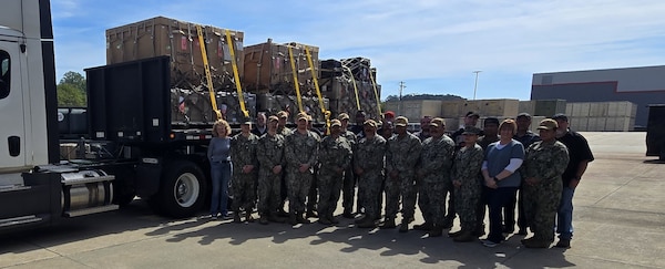 NMRLC's Expeditionary Medical Logistics (EML) directorate serves a vital role in ensuring that Navy, Marine Corps, and Joint Forces are medically equipped to handle operations in any expeditionary environment. During high-end competition or rapid response scenarios, this means designing and assembling medical capability sets tailored for immediate employment. Pictured in front of one of the command's 18-wheeled vehicles, the EML directorate stands together in a common mission.