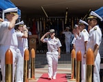 U.S. Navy Capt. Shannan Rotruck, commanding officer of Expeditionary Medical Facility 150-Bravo, salutes the sideboys after assuming command during a change of command ceremony, at Navy Medicine Readiness and Training Command San Diego, June 26. NMRTC San Diego supports Navy and Marine Corps readiness by ensuring its medical forces are ready to deploy and provide medical support, ashore or at sea. (U.S. Navy photo by Mass Communication Specialist 3rd Class Jason Afable)
