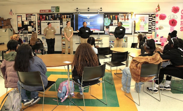 Lt. Cmdr. Stephanie Green, a dentist assigned to Navy Medicine Readiness and Training Command (NMRTC) Patuxent River, speaks to students at the Great Mills High School Career Center about career paths in Navy Medicine. Green, along with a team of medical and dental providers, hosted the session to share personal experiences and showcase the diverse opportunities available for both enlisted and officer roles within the U.S. Navy.