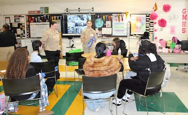 Lt. Natalie Grose, a physician assistant assigned to Navy Medicine Readiness and Training Command (NMRTC) Patuxent River, discusses career opportunities with students at the Great Mills High School Career Center. Grose, alongside Hospital Corpsman 3rd Class Rebecca Osgood (left), was part of a medical and dental team that hosted a special session to showcase the diverse enlisted and officer roles available within Navy Medicine.