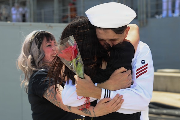 NAVAL BASE SAN DIEGO (June 27, 2026) – U.S. Navy Gas Turbine Systems Technician (Mechanical) Fireman Zacahry Gilstrap, assigned to the Ticonderoga-class guided-missile cruiser USS Lake Erie (CG 70), greets his loved one's upon the ship’s return to its homeport of Naval Base San Diego following 11 months of sustained operations at sea in the U.S. 4th Fleet area of operations June 27, 2026. An integral part of the U.S. Pacific Fleet, U.S. 3rd Fleet leads naval forces in the region and provides the realistic, relevant training necessary to execute our Navy's role across the full spectrum of military operations – from combat operations to humanitarian assistance and disaster response. U.S. 3rd Fleet works together with allies and partners to advance freedom of navigation and overflight, the rule of law, and other principles that underpin security for the region. (U.S. Navy photo by Mass Communication Specialist Seaman Aaron Sandovalmendoza)