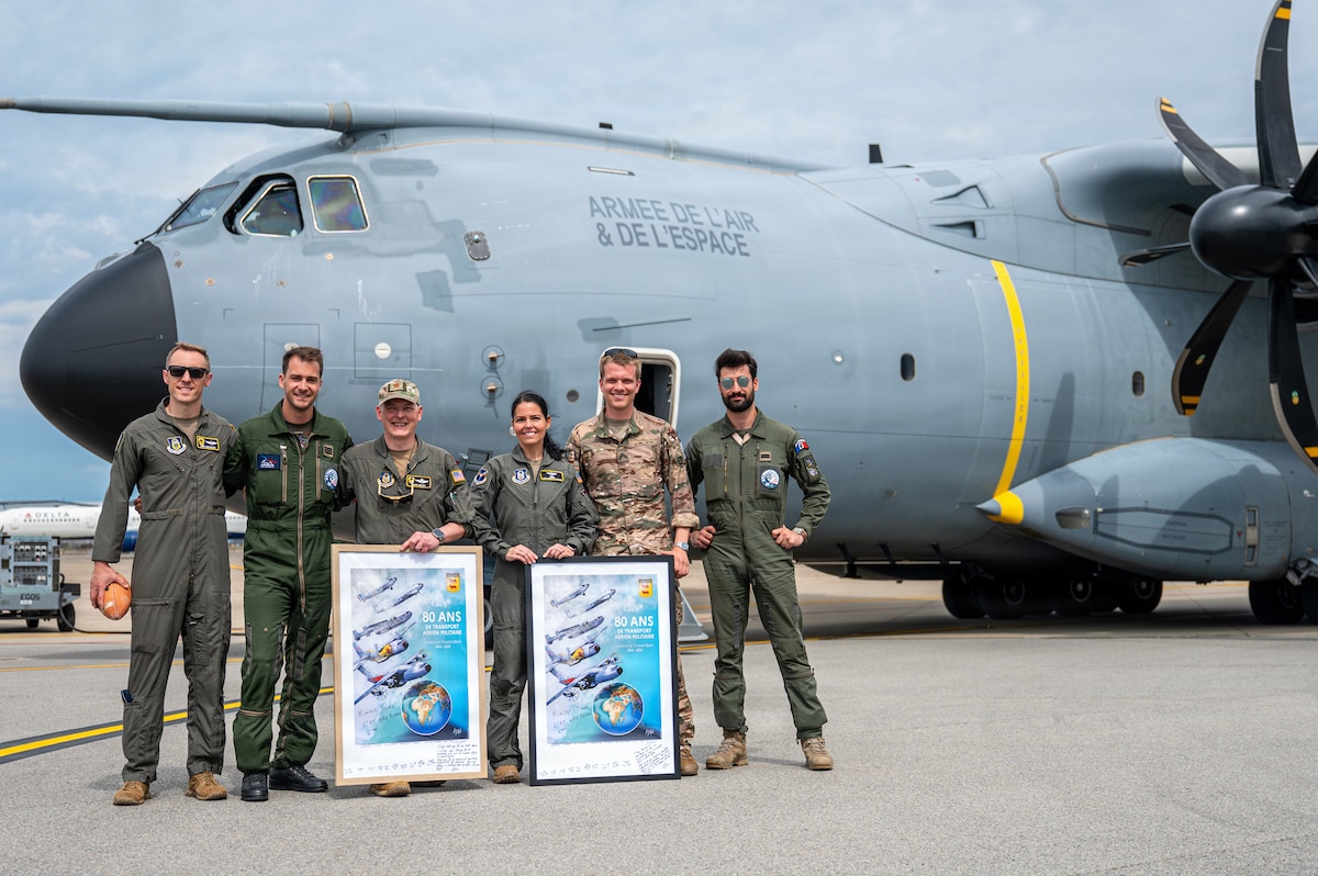 Service members from the United States and France pose for a photo