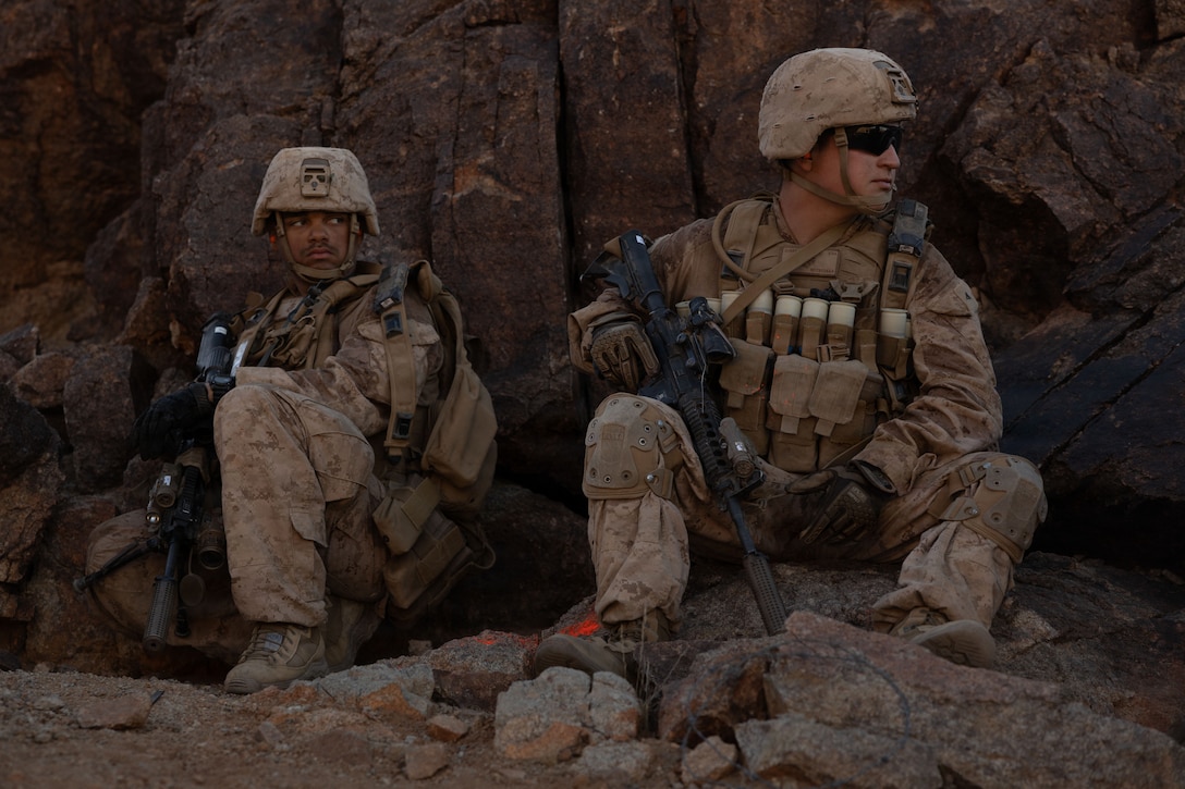 U.S. Marines with 1st Battalion, 24th Marine Regiment, 4th Marine Division, prepare to assault Machine Gun Hill during Integrated Training Exercise 3-26 at Range 400, Marine Corps Air Ground Combat Center, Twentynine Palms, California, June 10, 2026. ITX is designed to generate combat readiness and ensure the Reserve Component provides critical strategic depth to the Total Force. From complex combined arms maneuvers to all-domain integration, these Marines are proving that they are ready to augment, reinforce, and fight alongside the active component at a moment's notice. (U.S. Marine Corps photo by Pfc. Ethan DePaul)