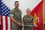 U.S. Marine Corps Lt. Col. Glenn W. Berdela Jr., left, commanding officer, 2nd Network Battalion, and Col. Juliet H. Calvin, commanding officer, Marine Corps Cyberspace Operations Group, pose for a photo during 2nd Network Bn’s 5th birthday ceremony at Marine Corps Base Camp Lejeune, North Carolina, June 3, 2026. 2nd Network Bn was activated on June 3, 2021, to ensure the operation of a resilient network that enables mission execution in the face of persistent cyber threats. (U.S. Marine Corps photo by Lance Cpl. Alyssa J. DeCrane)