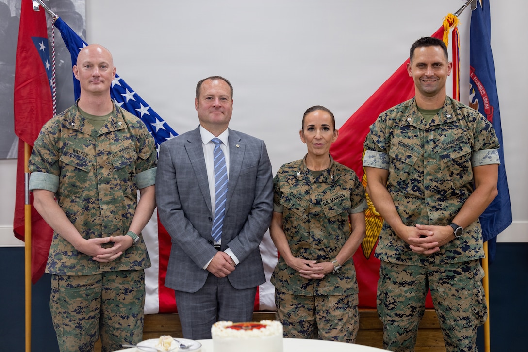 U.S. Marine Corps leaders with 2nd Network Battalion and Marine Corps Cyberspace Operations Group, pose for a photo during the 2nd Network Bn’s 5th birthday ceremony at Marine Corps Base Camp Lejeune, North Carolina, June 3, 2026. 2nd Network Bn was activated on June 3, 2021, to ensure the operation of a resilient network that enables mission execution in the face of persistent cyber threats. (U.S. Marine Corps photo by Lance Cpl. Alyssa J. DeCrane)