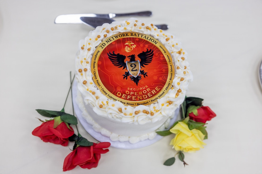 A cake is staged on a table during 2nd Network Battalion’s 5th birthday ceremony at Marine Corps Base Camp Lejeune, North Carolina, June 3, 2026. 2nd Network Bn was activated on June 3, 2021, to ensure the operation of a resilient network that enables mission execution in the face of persistent cyber threats. (U.S. Marine Corps photo by Lance Cpl. Alyssa J. DeCrane)