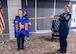 U.S. Air Force Col. Shawn Garcia, commander of the Lackland Medical Group, and Chief Master Sgt. Codi Bowman, senior enlisted leader of the Lackland Mental Health Squadron, unfurl the squadron guidon during the unit's activation ceremony at Wilford Hall Ambulatory Surgical Center, Joint Base San Antonio-Lackland, Texas, June 25, 2026.