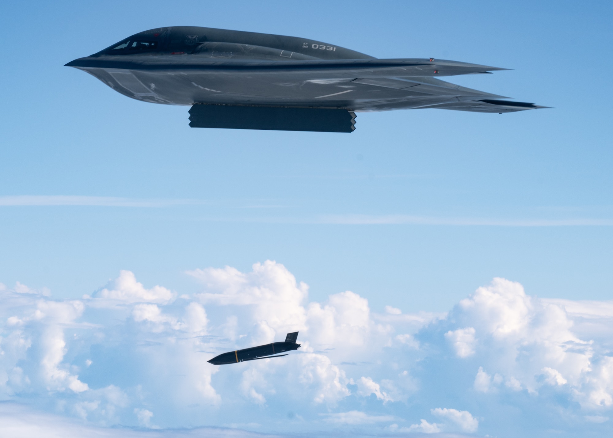 A stealth bomber fires a cruise missile
